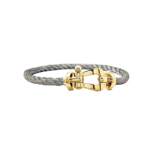 Bracelet Bracelet Fred, "Force 10", or jaune, acier. 58 Facettes 35556