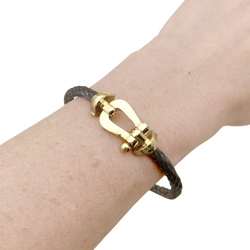 Bracelet Bracelet Fred, "Force 10", or jaune, acier. 58 Facettes 35556