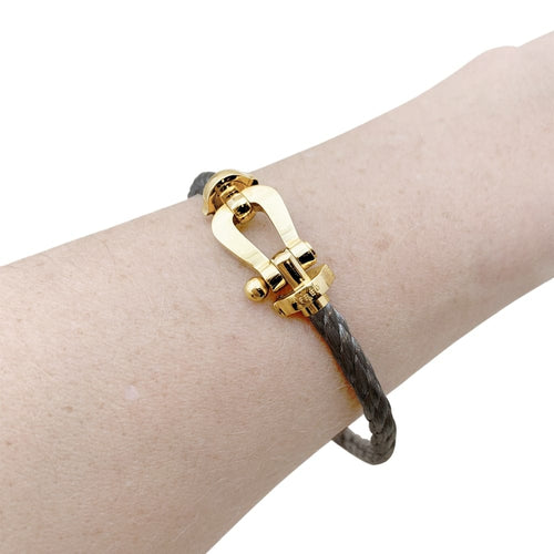 Bracelet Bracelet Fred, "Force 10", or jaune, acier. 58 Facettes 35556