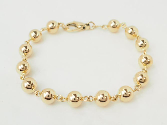 Bracelet Bracelet marseillais à boules 8 mm en or rose 18 carats 58 Facettes 33734