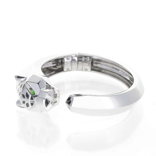https://francinejoaillerie.com/wp-content/uploads/2025/04/Bracelet-Cartier-Panthere-Or-Blanc-1-1.jpeg