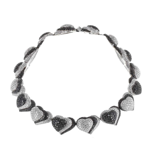https://francinejoaillerie.com/wp-content/uploads/2026/04/Collier-de-Grisogono-Or-Blanc-Diamants-Noirs-et-Blancs.jpg