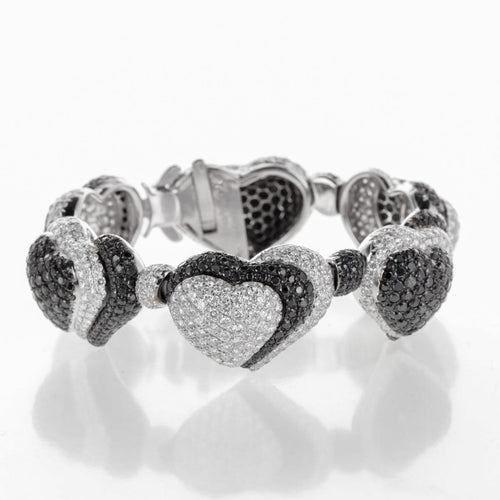 https://francinejoaillerie.com/wp-content/uploads/2026/04/Bracelet-de-Grisogono-Or-Blanc-Diamants-Noirs-et-Blancs.jpg