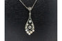 Collier Collier - Pendentif poire en or jaune et blanc avec perles et diamants 58 Facettes 10736