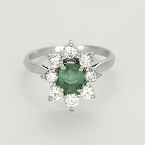 Bague 55 Bague Marguerite en or gris, émeraude et diamants 58 Facettes 260212