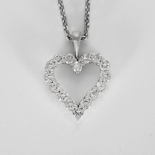 Collier Collier et Pendentif Coeur en or gris et diamants 58 Facettes 260297