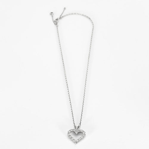 Collier Collier et Pendentif Coeur en or gris et diamants 58 Facettes 260297