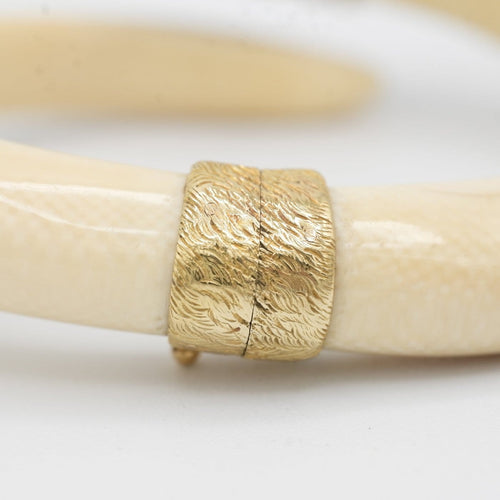 Bracelet Bracelet jonc animalier en ivoire et or jaune 18 carats 58 Facettes 1057/09