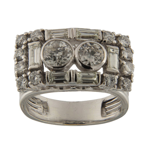 https://www.gioielleriaguidetti.it/wp-content/uploads/2026/03/G3903b-anello-vintage-guidetti-oro-diamanti-brillanti-baguette.jpg