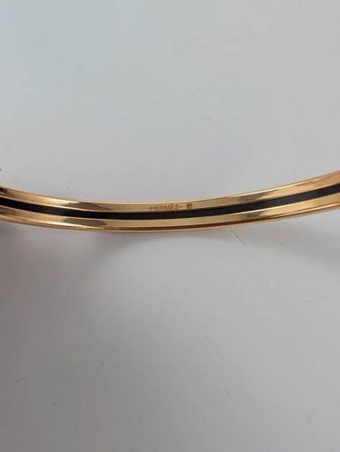Bracelet Hermès - Bracelet jonc De l'Ombrelle aux Duels en plaqué or rose et émail 58 Facettes 1143