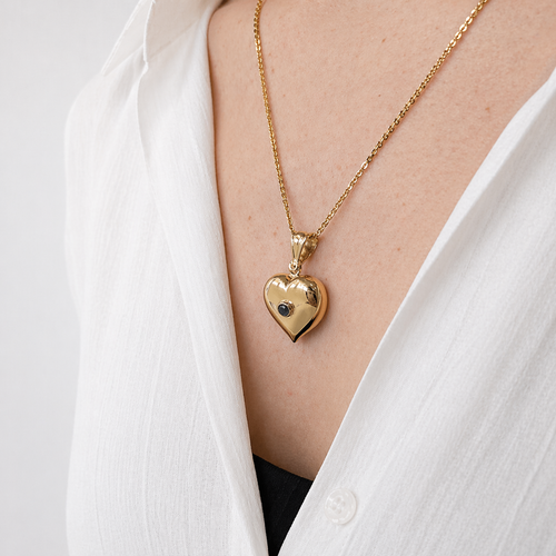 https://18carats.fr/wp-content/uploads/2026/04/36358-36518-Pendentif-coeur-en-or-jaune-et-pierre-verte.png