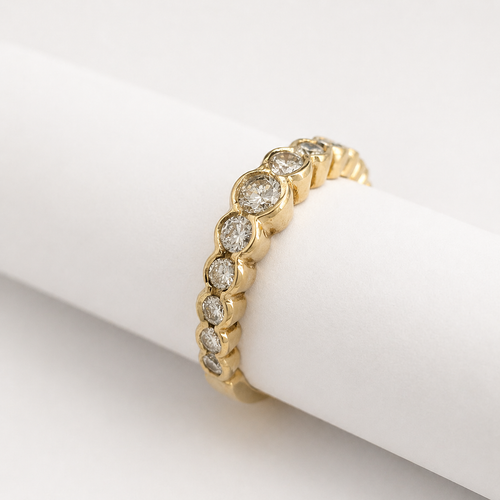 https://18carats.fr/wp-content/uploads/2026/04/36583-36604-Obrączka ślubna-demi-tour-diamants-en-or-jaune.png