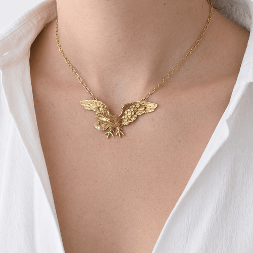 https://18carats.fr/wp-content/uploads/2026/04/36164-36524-Collier-pendentif-aigle-en-or-jaune-perle-en-pampille.png