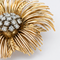 https://18carats.fr/wp-content/uploads/2026/04/36305-36310-Pendentif-floral-en-or-jaune-et-diamants.png