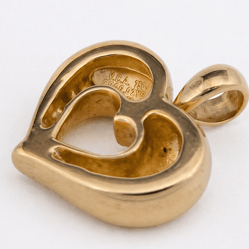 https://18carats.fr/wp-content/uploads/2026/04/36380-36386-Pendentif-Van-Cleef-Arpels-en-or-jaune.png
