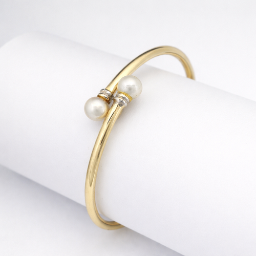 https://18carats.fr/wp-content/uploads/2026/04/36269-36282-Bracelet-en-or-jaune-et-perle.png