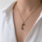 https://18carats.fr/wp-content/uploads/2026/04/36393-36534-Pendentif-combine-telephonique-en-or-jaune-et-diamants.png