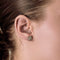 Paire de Boutons d'oreilles en or gris, diamants princesse et diamants taillés en brillant 58 Facettes 260273