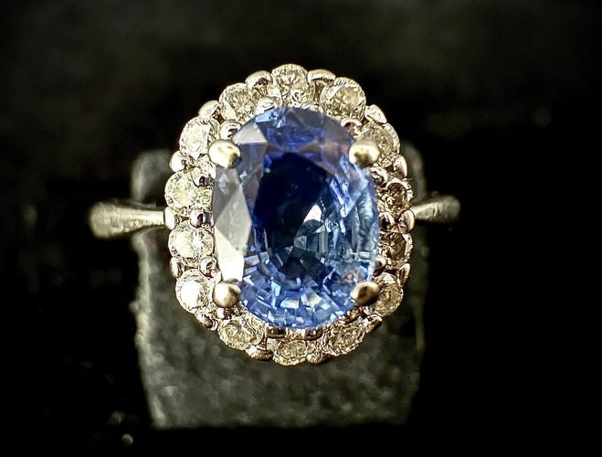 Bague 52 Bague marguerite - Saphir 1,10 ct et diamants en or 18 carats 58 Facettes Bague 001