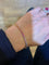 https://cdn.shopify.com/s/files/1/0647/1470/3075/files/Bracelet_de_Luxe_-_Bracelet_Tennis_5.10_Carats_Saphirs_Arc-En-Ciel_Or_Rose_-_Joaillerie_Paris_-_Les_Pierres_de_Julie_2.jpg?v=1762272830