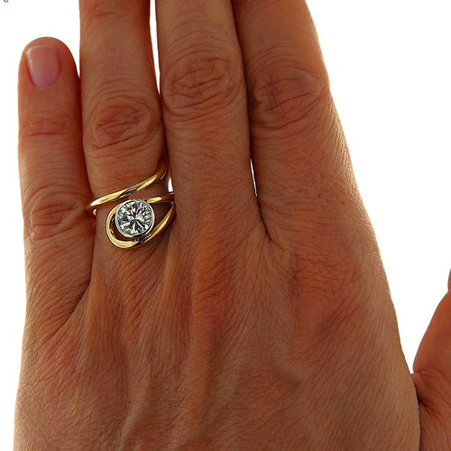 https://www.gioielleriaguidetti.it/wp-content/uploads/2026/04/G3934-anello-solitario-oro-giallo-bianco-diamante-brillante-2.jpg