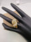 Bague 53 Cantamessa - Bague motif fleur calla en or jaune 18 ct, diamants et saphir 58 Facettes CV-051