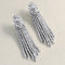 boucles-d-oreilles-pendants-or-blanc-et-diamants.jpg