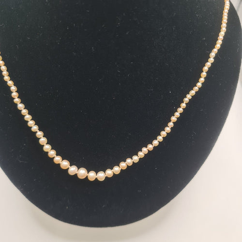 Collier Collier en perles fines avec fermoir en or jaune 18k 58 Facettes #BT