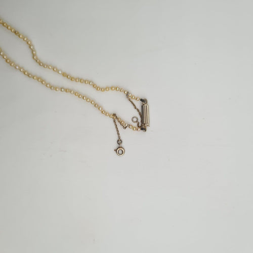 Collier Collier en perles fines avec fermoir en or jaune 18k 58 Facettes #BT