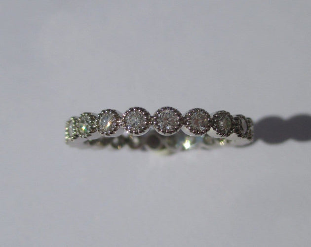 Bague 54 Bague alliance perléee - Bague en platine et diamants 58 Facettes Bague