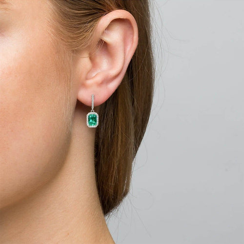 Boucles d'oreilles Boucles d'oreilles pendantes en or blanc, émeraudes et diamants 58 Facettes