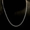 Collier AITCHES - Collier tennis Embrace en or blanc 18K et diamants 58 Facettes GPD1045WG