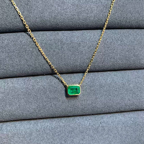 Collier Collier serti clos en or 18 carats et émeraude 58 Facettes GPD1070YG