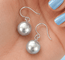 Boucles d'oreilles Boucles d’oreilles pendantes - Perles de culture de Tahiti rondes en or blanc 18K 58 Facettes 1783