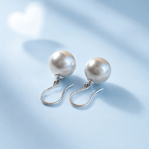 Boucles d'oreilles Boucles d’oreilles pendantes - Perles de culture de Tahiti rondes en or blanc 18K 58 Facettes 1783