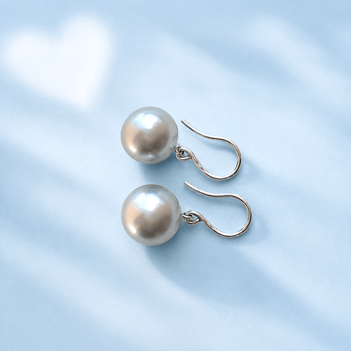 Boucles d'oreilles Boucles d’oreilles pendantes - Perles de culture de Tahiti rondes en or blanc 18K 58 Facettes 1783