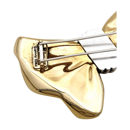 Broche Broche Fred, "Nœud", or jaune et acier. 58 Facettes 35428