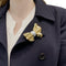 Broche Broche Fred, "Nœud", or jaune et acier. 58 Facettes 35428