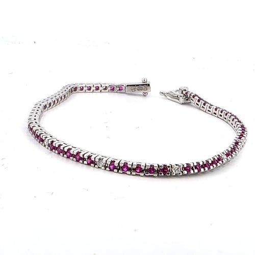 Bracelet Bracelet tennis en or blanc 18 kt, rubis et diamants 58 Facettes 236 OC