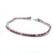 Bracelet Bracelet tennis en or blanc 18 kt, rubis et diamants 58 Facettes 236 OC