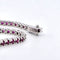 Bracelet Bracelet tennis en or blanc 18 kt, rubis et diamants 58 Facettes 236 OC