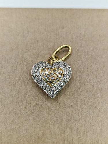 Pendentif Pendentif cœur en or jaune et blanc pavé de diamants 58 Facettes CV-058