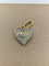 Pendentif Pendentif cœur en or jaune et blanc pavé de diamants 58 Facettes CV-058