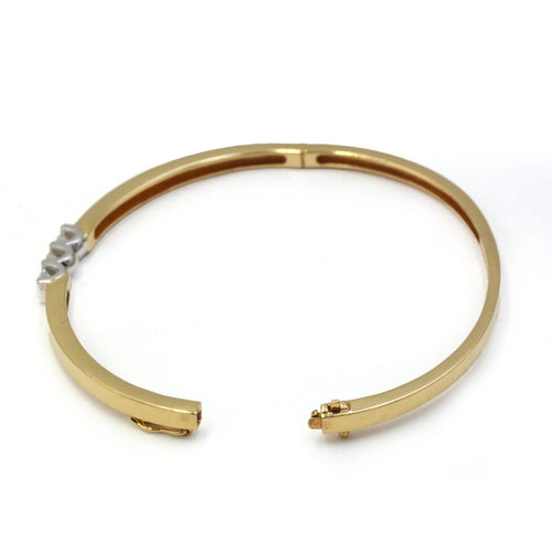 Bracelet Bracelet rigide - Bracelet en or jaune et diamants 58 Facettes 260118R
