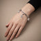 Bracelet Bracelet CHANEL avec charms Or gris et Diamants 58 Facettes OC-62100140