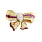 Broche Laço em ouro amarelo, rubis e diamantes 