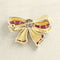 Broche Broche Nœud Or jaune, Rubis et Diamants 58 Facettes 65000020