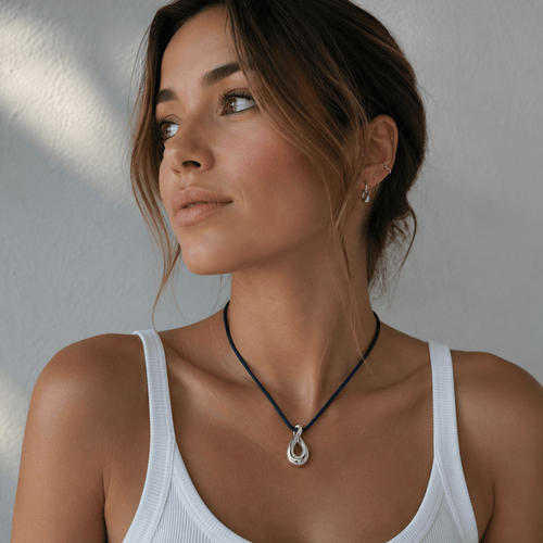 Pendentif Fred - Pendentif Mouvementé en or blanc 58 Facettes 1.0001462/1