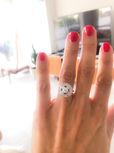 Bague Bague marguerite en or gris, platine et diamants 58 Facettes
