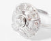 Bague Bague marguerite en or gris, platine et diamants 58 Facettes